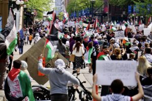 Protestors in Chicago May 2021 Hold Palestinian Flags and March in a Solidarity Demonstration