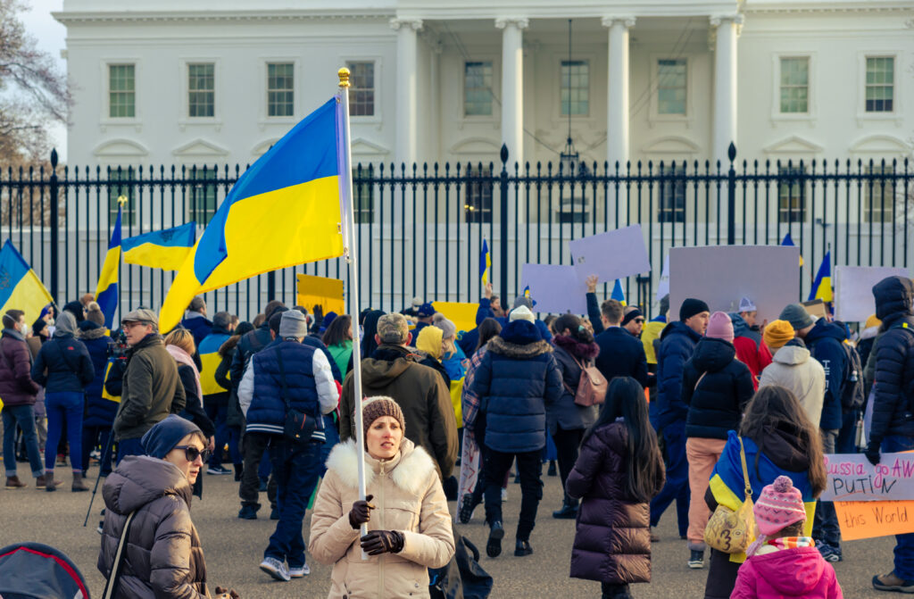 A small group of pro-Ukraine protesters, some with Ukrainian flags, protest for U.S. support in front of the Whtie House