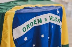 This is a side-on view of the Brazilian flag draped over a table. The words, "Ordem e Progresso" are visible.