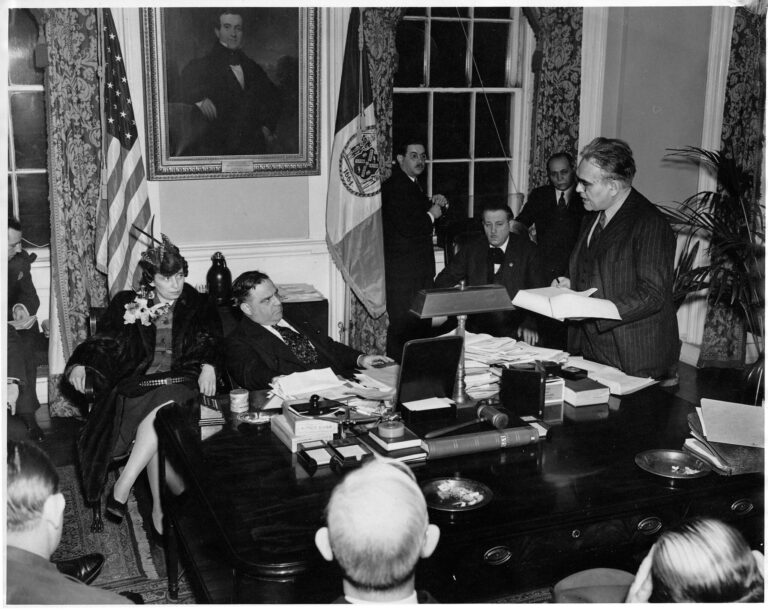 Meeting in Mayor Fiorello LaGuardia's office. Julius Hochman is speaking while Luigi Antonini and others look on. Photo: International Ladies Garment Workers Union Photographs (1885-1985)