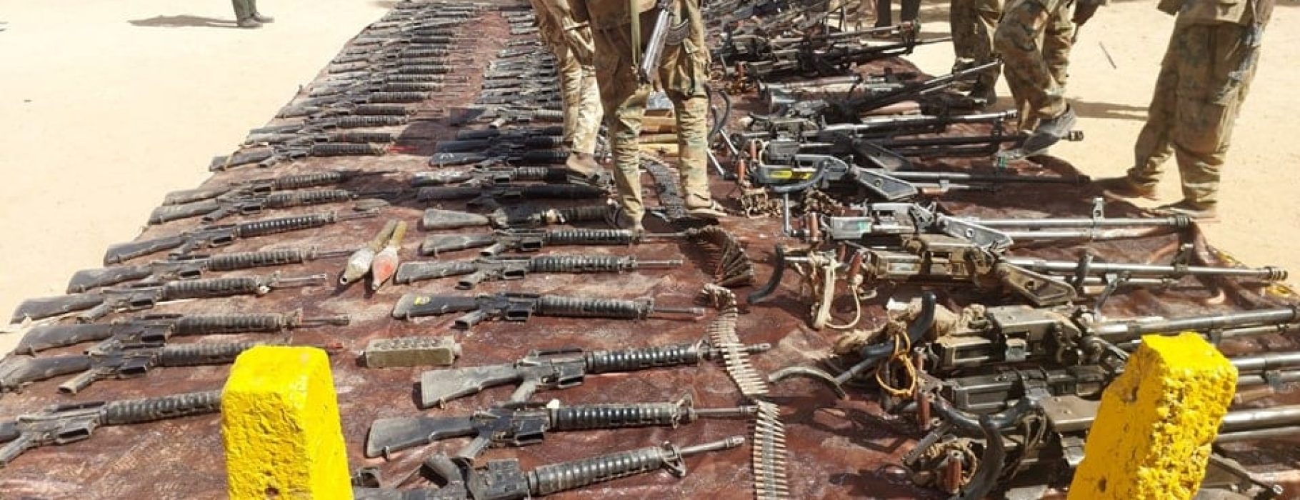 Sudanese army soldiers show weapons allegedly seized from the RSF paramilitaries in Khartoum North, March 18, 2024. Photo Credit: SAF Facebook Page