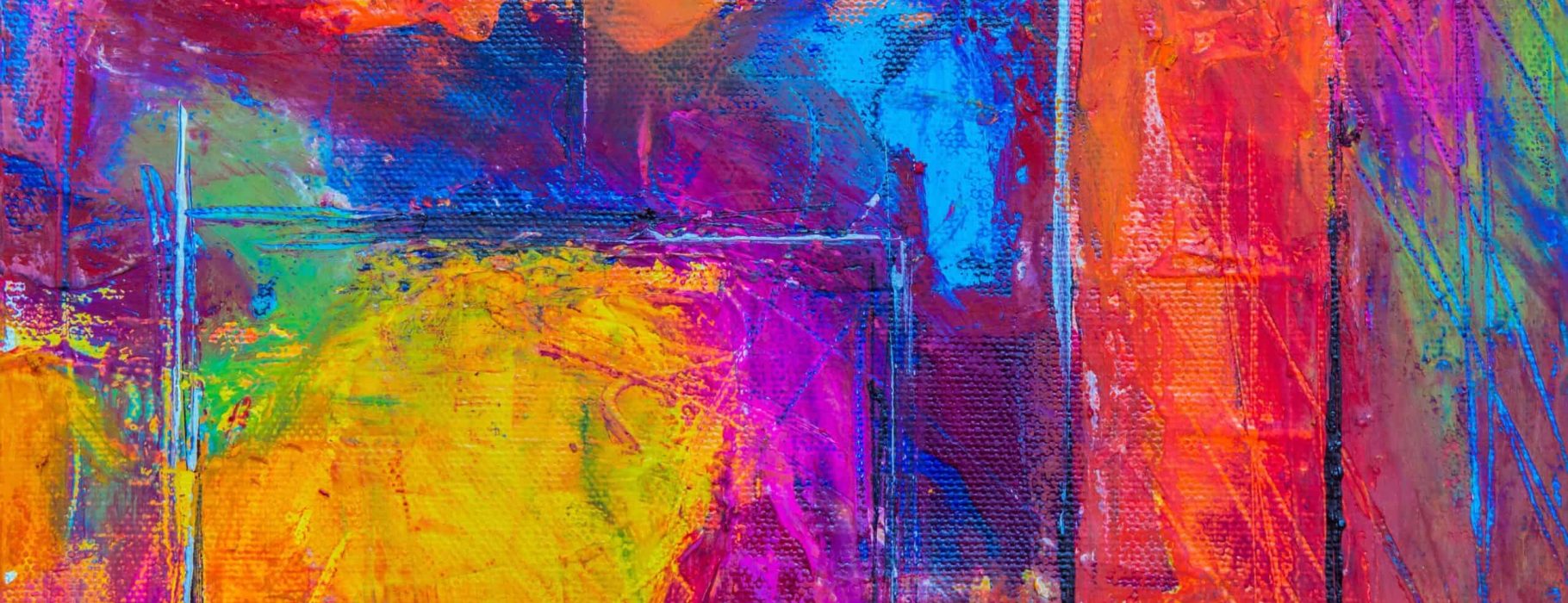 This vibrant abstract painting features an explosion of bright colors, including red, pink, yellow, and blue, creating a lively and dynamic visual experience.